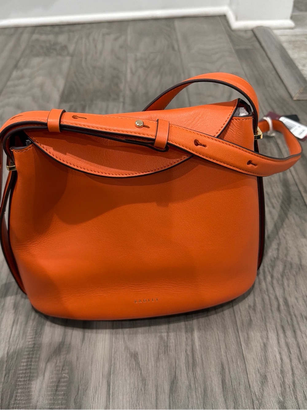 RADLEY LONDON Orange Leather Crossbody Saddle Bag
